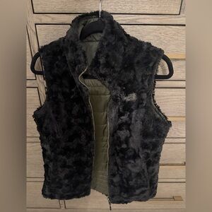 The North Face reversible black faux fur/ olive green vest.  Sm. Exc condition.